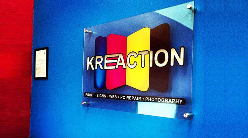 Vinyl covered sign in acrylic