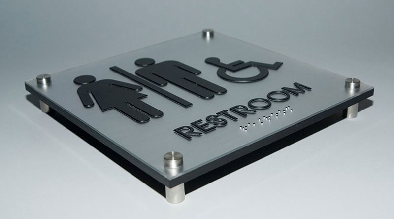 Toilet sign in vinyl and acrylic